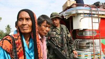 Filipino soldiers inspect vehicles in Shariff Aguak, the capital of Maguindanao province.