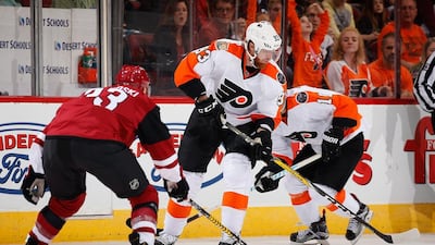 Jakub Voracek of the Philadelphia Flyers skates with the puck against Alex Goligoski of the Arizona Coyotes on October 15, 2016 in Glendale, Arizona. Christian Petersen / Getty Images