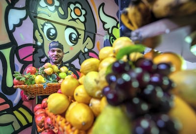 Mounes Riffai at his juice bar, Fruit Blend Juices. Victor Besa / The National