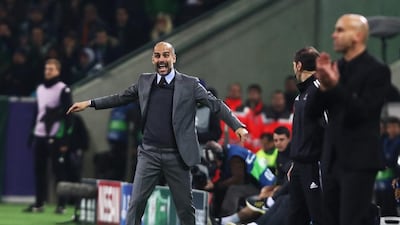 Pep Guardiola is a happy man despite Manchester City's underwhelming performance on Wednesday night. Alex Grimm / Getty Images