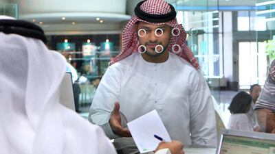 Lending to small businesses and individuals slowed in the second quarter. Paulo Vecina / The National