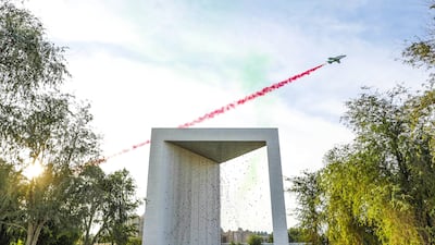 Aircraft fly over The Founder's Memorial – a national tribute to the Founding Father, Sheikh Zayed – on the UAE's 50th National Day. Photo: Wam