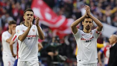 18. Sevilla - 3210 points. Sergio Reguilon and Jesus Navas greet their fans. EPA