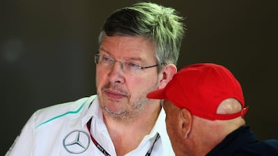 Ross Brawn, the Mercedes team principal, has had overtures made by Niki Lauda, right, and driver Nico Rosberg to stay with the team through next season. Paul Gilham / Getty Images