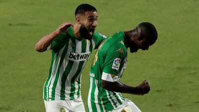 Betis midfielder William Carvalho celebrates with teammate Nabil Fekir after scoring their second goal. EPA