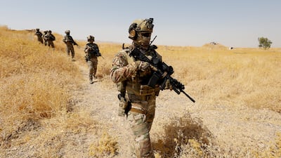Kurdish special forces patrol the outskirts of Erbil in northern Iraq. Security concerns have grown ahead of the planned withdrawal of US-led coalition forces from the country. Reuters