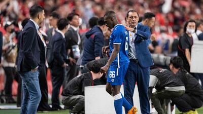 Al Hilal manager Ramon Diaz consoles Gustavo Cuellar after the defeat to Urawa Red Diamonds in the Asian Champions League final. AFP