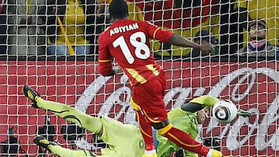 Uruguay's goalkeeper Fernando Muslera saves a penalty by Ghana's Dominic Adiyiah during the shoot-out in the World Cup quarter-final.