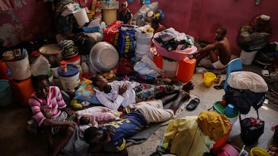 People displaced by gang war violence live inside a classroom at Darius Denis school, which transformed into a shelter where people live in poor conditions, in Port-au-Prince, Haiti May 5, 2024. Nearly half of the country’s population is struggling to feed themselves due to the conflict, unable to work, the families depend on food rations and hygiene kits brought in by non-governmental organizations. "We can't do anything - there's no money, no trade," said Mirriam Auge, 45, a mother who was forced out of her home three months ago. "We lost everything in our homes, I cried while everyone was sleeping. "REUTERS/Ricardo Arduengo SEARCH "ARDUENGO VALTIERRA HAITI HUNGER" FOR THIS STORY. SEARCH "WIDER IMAGE" FOR ALL STORIES. TPX IMAGES OF THE DAY
