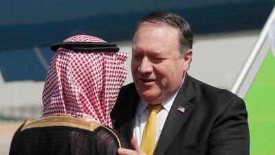 Mr Pompeo greets Mr Al Jubeir after arriving in Riyadh. AP Photo