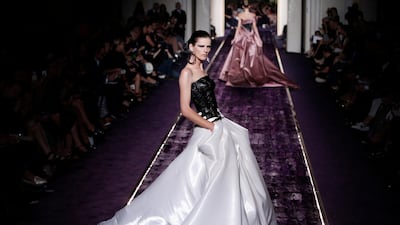 Stella Tennant wearing Haute Couture Winter 2014/15 by Atelier Versace July 2014. EPA