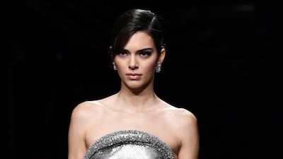 Kendall Jenner presents a creation by Versace during Milan Fashion Week, on February 21, 2020. EPA