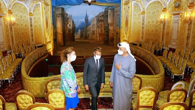 Sheikh Mohamed bin Zayed, Crown Prince of Abu Dhabi and Deputy Supreme Commander of the Armed Forces, with French President Emmanuel Macron and Marie-Christine Labourdette, head of the Public Establishment of the Chateau de Fontainebleau, during their visit of the Chateau of Fontainebleau, outside Paris, earlier this month. EPA