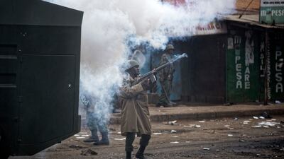 Kenyan riot police fire tear gas at protesters during clashes in the Kawangware area of Nairobi on August 10, 2017. Ben Curtis / AP Photo