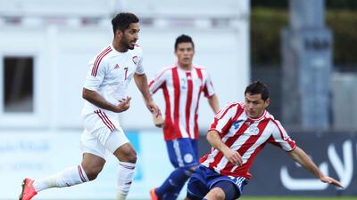 Ali Mabkhout of the UAE challenges a Paraguay player for possession in the UAE's friendly in Austria on September 7, 2014. Courtesy UAE FA