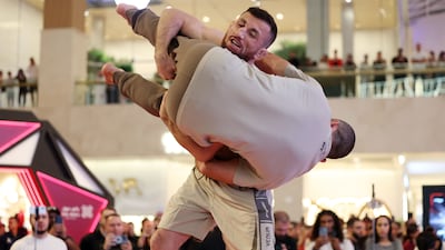 Merab Dvalishvili takes part in an open workout before his title fight against champion Petr Yan in the bantamweight division of UFC 333, at Yas Mall, Abu Dhabi. Chris Whiteoak / The National