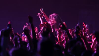 Crowd enjoying the Redfest DXB held at Dubai Media City Amphitheatre in Dubai. Pawan Singh / The National