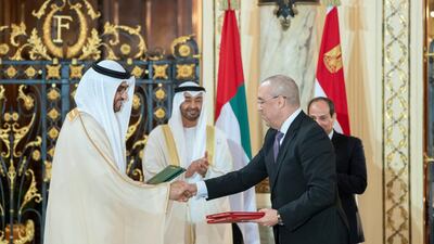 Sheikh Mohamed and President Sisi witness an MOU signing ceremony at Ras El Tin Palace. Rashed Al Mansoori / Ministry of Presidential Affairs