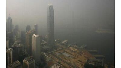 A view of the central business district, including the Two IFC commercial tower, centre, as seen from the 70th floor of the Bank of China Tower, illustrates Hong Kong's air pollution.
