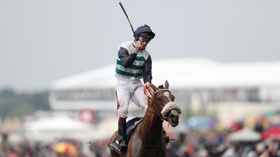 Oisin Murphy on Dashing Willoughby celebrates after winning the Queen's Vase race. Reuters