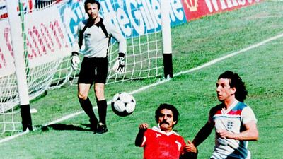 Kuwait’s Abdullah Mayuf, centre, fights for the ball against Paul Mariner of England during their 1982 World Cup Group D match. AFP