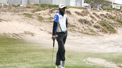 Ankush Saha, a golfer from India, competes in the Special Olympics World Games at Yas Links Golf Club. Khushnum Bhandari for The National