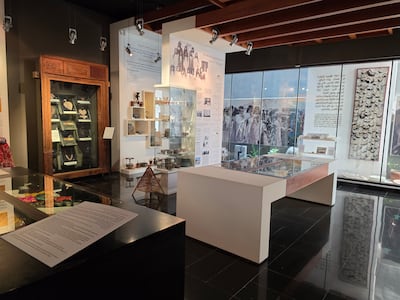 The ground-floor gallery with its installation of niqab and displays of everyday objects. Photo: Katy Gillett for The National