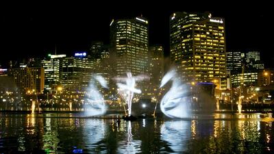 A light show featuring a ballet dancer and swans from Swan Lake is projected onto spraying water by the Vivid Aquatique Water Theatre during a preview of the Vivid Sydney light and music festival May 21, 2014. For 18 days beginning on May 23 the Vivid Sydney festival, one of the world’s largest creative industry forums, will combine outdoor lighting sculptures and installations. Jason Reed / Reuters