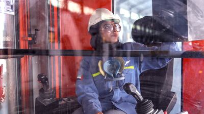 Ms Al Hashimi spends six hours a day sitting in a crane looking over 1.6km long line of pots or furnaces and replacing metal components that need regularly changing