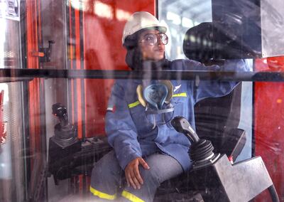 Operating a crane and handling heavy equipment is crucial to the functioning of aluminium smelters. Victor Besa / The National