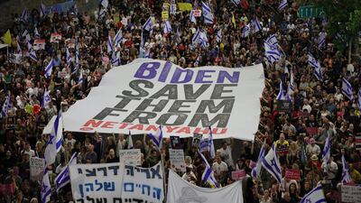 Protesters take to the streets to call on the Israeli cabinet to sign a hostage deal in Tel Aviv this month. EPA