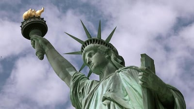 The US EB-5 visa investor programme provides a green card to any foreigner investing at least $500,000 and creating at least 10 jobs in the country. Richard Drew / AP Photo