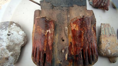 A part of a wooden statue that was found at a recently discovered tomb in the Draa Abul Nagaa necropolis in Egypt. Khaled Elfiqi / EPA