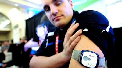 Some retailers in the UAE have begun selling sleep-tracking devices such as the BodyMedia Fit Core Armband, above. Frederic Brown / AFP