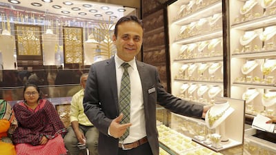 Suresh Mulani from Kanz Jewels in Dubai says business is usual for gold jewellers. Pawan Singh / The National