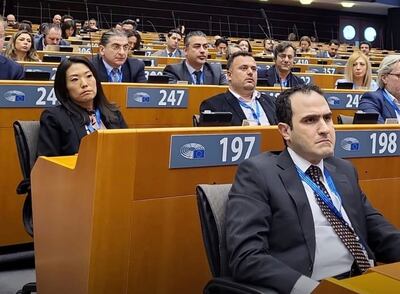 Ayham Al Ghazzy, right, at a conference on Syria's future in Brussels in 2014. Photo: Ayham Al Ghazzy