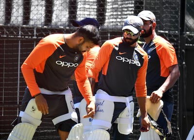 Rohit Sharma, left, and Ravindra Jadeja have had to deal with injury problems in Australia this year. Daniel Kalisz / Getty Images
