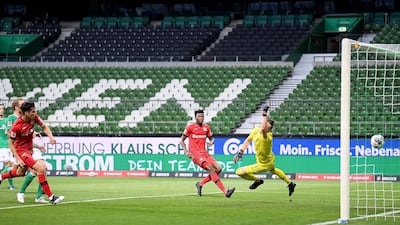 Kai Havertz, left, scores to give Leverkusen a 2-1 lead over Bremen. EPA