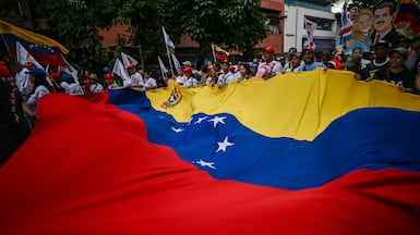 Supporters of deposed Venezuelan President Nicolas Maduro during a demonstration calling for the release of Mr Maduro and his wife from a US prison in Caracas. Thousands of Maduro's supporters marched in Caracas on January 23, calling for his release, as Venezuela marked the 68th anniversary of the fall of military dictatorship. AFP