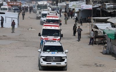 A UN vehicle leads ambulances carrying war-wounded people and patients leaving Gaza for treatment abroad through the Rafah border crossing between Gaza and Egypt on March 19, 2026. Reuters