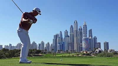 epa08147078 Wu Ashun of China practices ahead of the Omega Dubai Desert Classic 2020 Golf tournament at Emirates Golf Club in Dubai, United Arab Emirates, 21 January 2020. EPA/ALI HAIDER