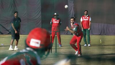 Oman’s Zeeshan Maqsood bowls at the nets during a practice session at the Himachal Pradesh Cricket Association (HPCA) stadium for the ICC World Twenty20 2016 cricket tournament in Dharmsala, India, Tuesday, March 8, 2016. The venue, which hosts several ICC Twenty20 World Cup matches, will hold the second match between Oman and Ireland on March 9. (AP Photo/Ashwini Bhatia)