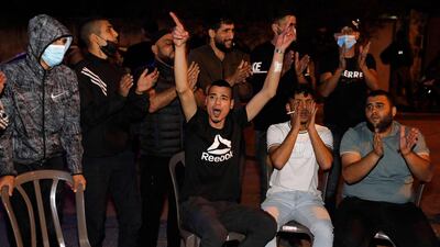 Palestinians protest about local families facing eviction from the Sheikh Jarrah neighbourhood of East Jerusalem. AFP