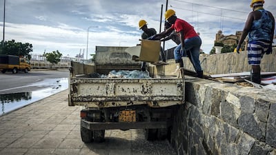Workers remove shards of glass and debris at the Kingsbury Hotel in Colombo, Sri Lanka, April 22, 2019. Jack Moore / The National.