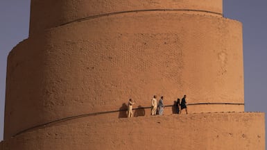 Iraqis walk at the Malwiya minaret, a treasured national monument. Iraqis today have greater access to knowledge and international developments than they could have dreamt of a few years ago. AFP