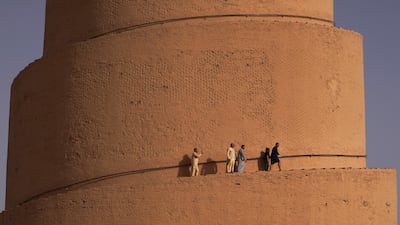 Iraqis walk at the Malwiya minaret, a treasured national monument. Iraqis today have greater access to knowledge and international developments than they could have dreamt of a few years ago. AFP
