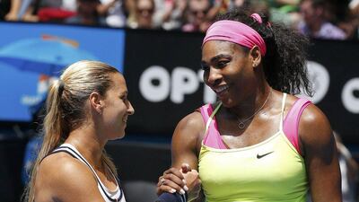 Serena Williams, right, shakes hands with Dominika Cibulkova after winning their Australian Open quarter-final match. Athit Perawongmetha / Reuters