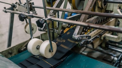 Packaging rolls off the press at a UAE printery. Alex Atack for The National