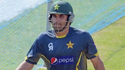 Pakistan captain Misbah-ul-Haq leaves the nets after batting at the Sharjah cricket stadium in Sharjah on December 11, 2014. Aamir Qureshi / AFP
