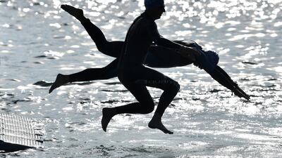 Athletes take to the water during the swimming leg of the Ironman 70.3 Elsinore, in Helsingor, eastern Denmark. Getty